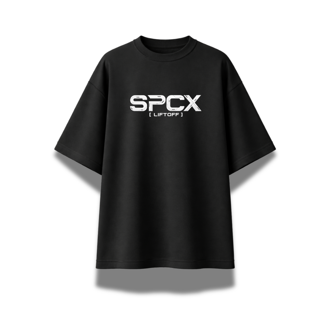 A black short-sleeve t-shirt with a large black-and-white graphic of a space shuttle emerging from smoke on the front. The shirt features a white stylized 'X' logo on the upper chest and the text 'THE FUTURE IS PUBLIC' near the bottom of the graphic, displayed against a clean white background.