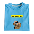 Folded blue t-shirt with 'Me, Myself & I' text and graphic on a white background