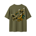 An olive green short-sleeve t-shirt shown from the back, featuring a large graphic print of two stylized birds in gold, white, and teal tones.
