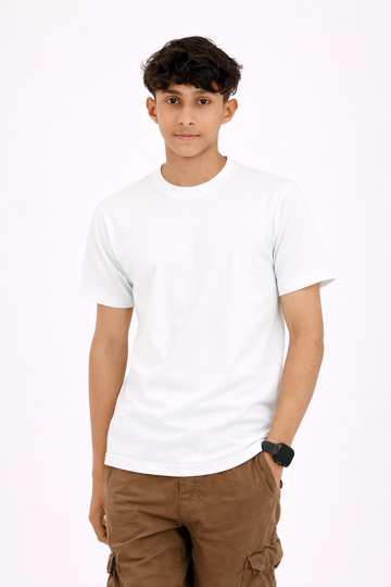 Person wearing a plain white t-shirt and brown pants on a white background